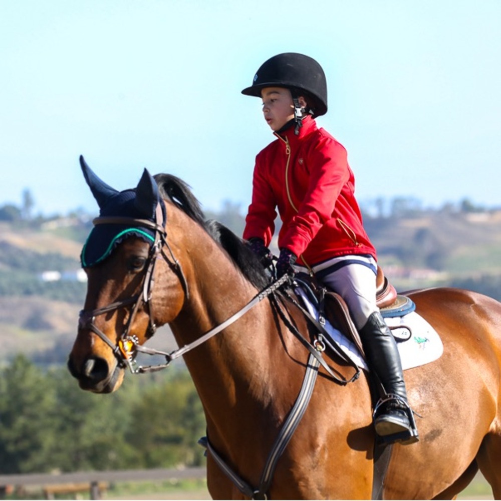 Fire red Ariat jacket. Ladies XS. Stand out in the barn or show!